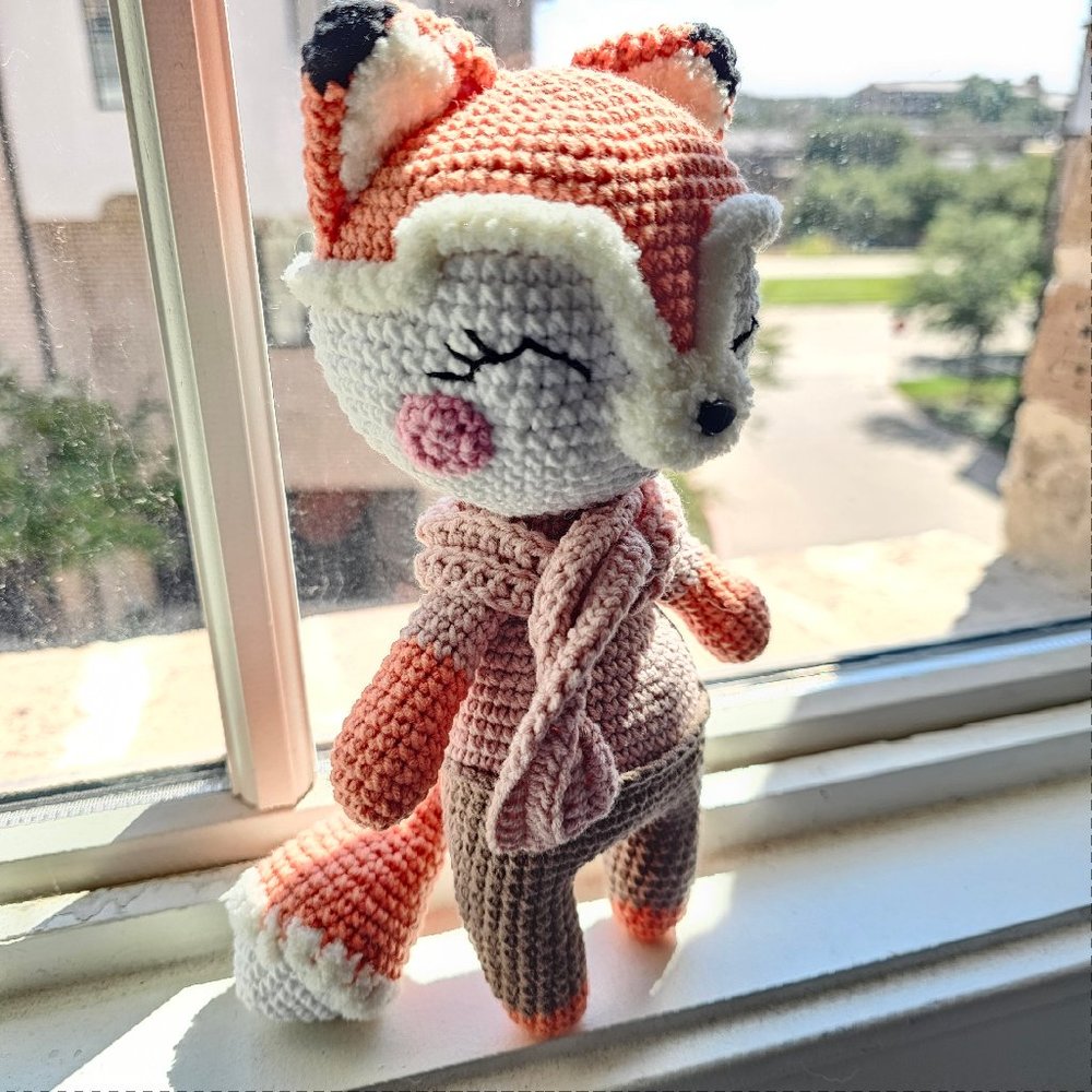Adorable plush fox crocheted by hand
